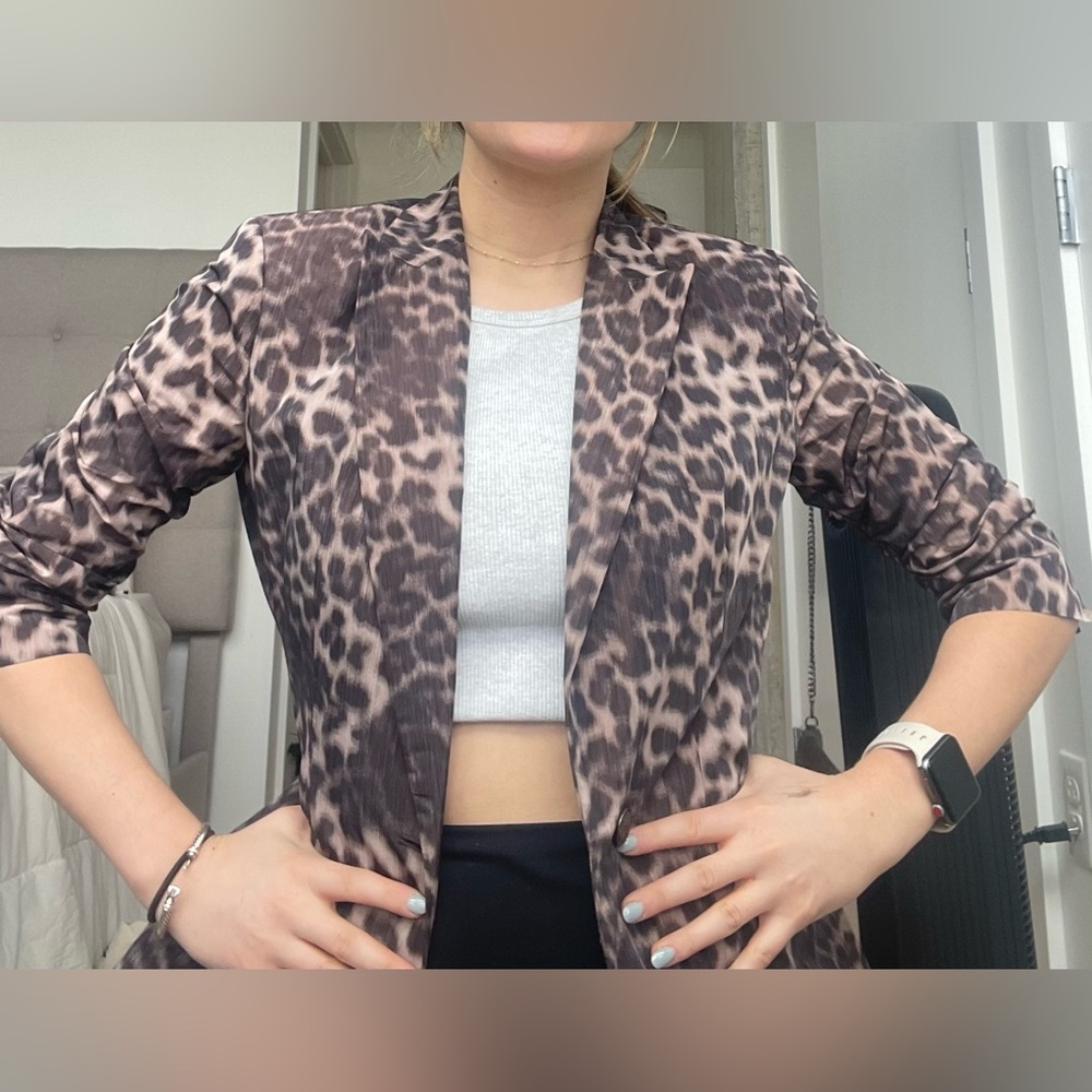 Calvin Klein  Blazer! Never worn, cheetah print and quarter sleeve!